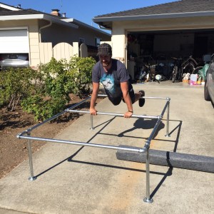 John testing the bed frame!